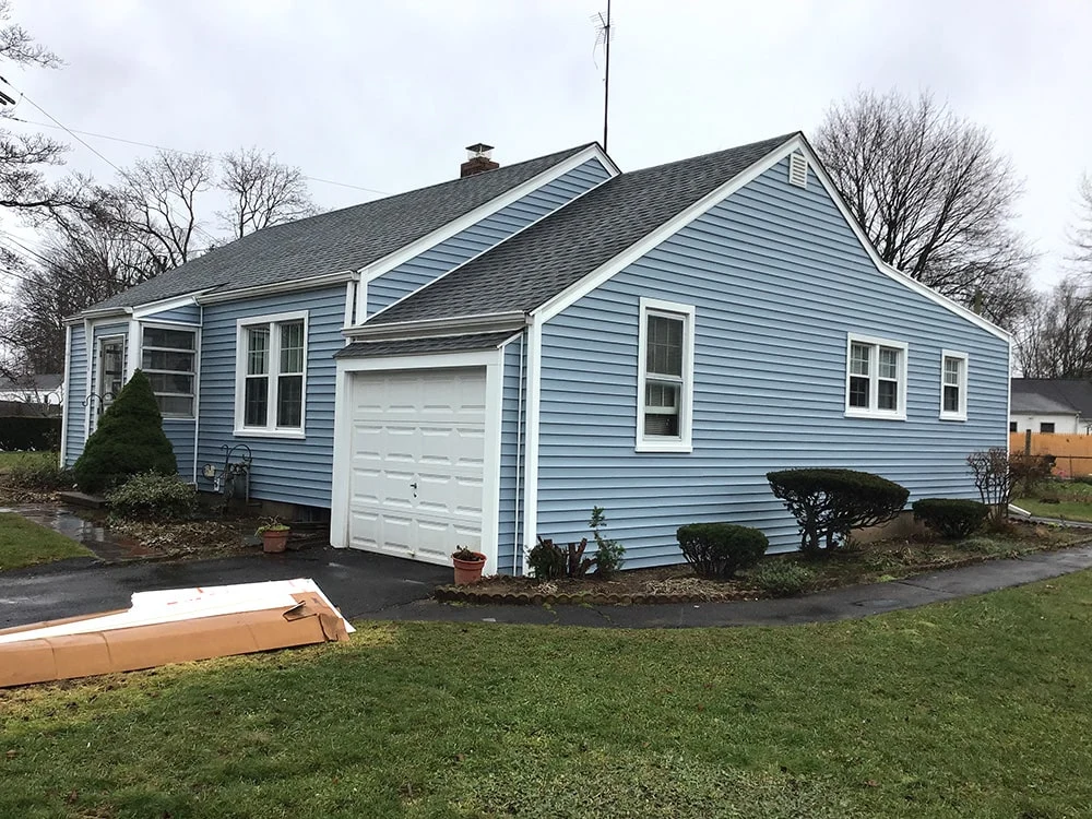 blue vinyl siding installation